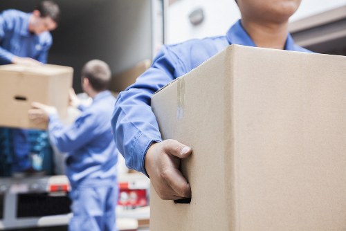 House removals planning in Crayford with moving boxes and a van